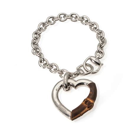 gucci sterling silver and bamboo heart bracelet|heart bracelet with gucci trademark.